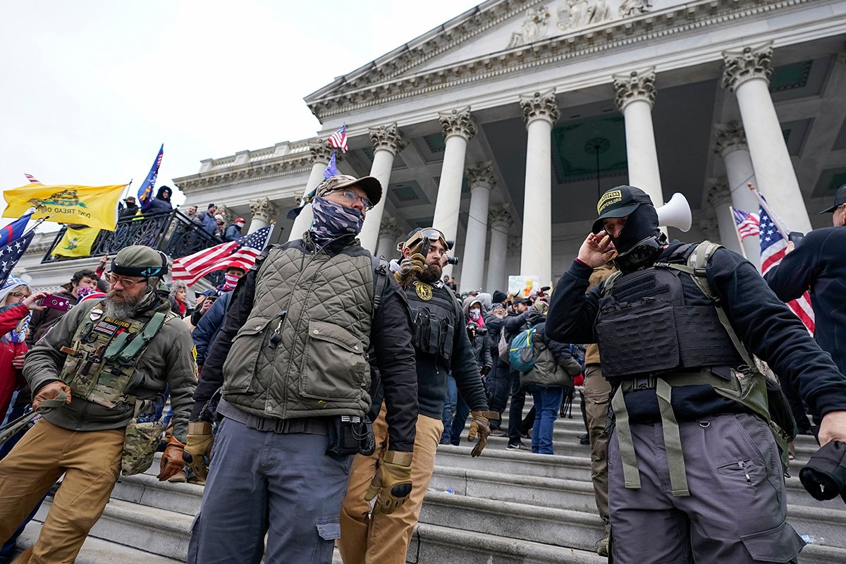 Members of the Oath Keepers stand on the East Front of the U.S. Capitol on Jan. 6, 2021, in Washington.
